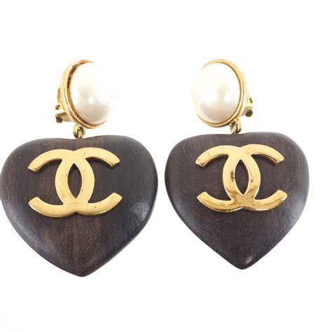 chanel wood heart earrings|cc logo chanel earrings.